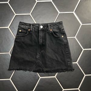 Black denim skirt